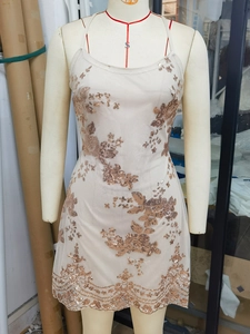 Sleeveless backless birthday mini dress with sequins and elegant floral vine patterns