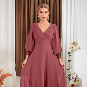 Elegant dusty pink V-neck long sleeve evening dress with pleated bodice and flowy skirt