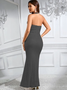 Detail of grey backless sequin evening dress with a slim-fit mermaid silhouette