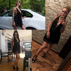Detail view of black sequin mini dress with deep V-neck and fringe tassel hemline
