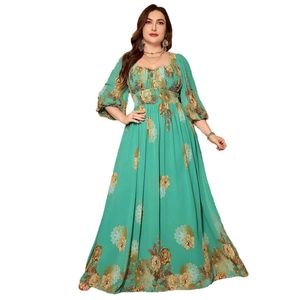 Elegant plus size mint green chiffon maxi dress with yellow floral prints and puff sleeves