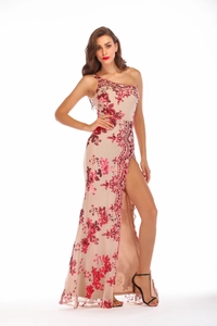 Detail of single shoulder champagne evening dress with red sequin floral embroidery