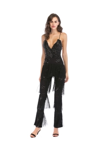 Detail of black sequined bodysuit with layered long tassels and V-neckline