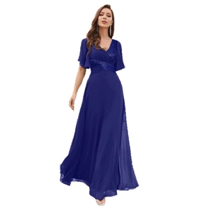 Robe de soirée élégante bleu marine avec col en V, manches volantées et taille à paillettes