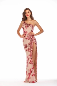 Detail of red floral sequin embroidery and side slit on a sexy one-shoulder evening gown