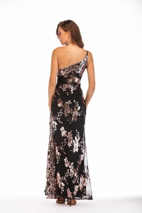 Close-up of sparkling sequin floral embroidery and open back detail of this evening dress