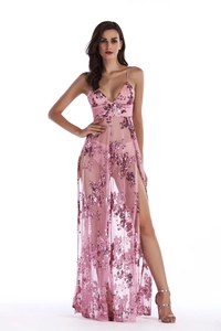 Detail of pink sequin mesh evening dress featuring a high slit and sheer floral patterns