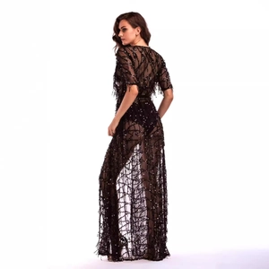 Sexy black sheer mesh floor-length dress with sequins and elegant tassel details