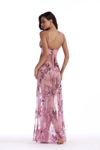Macro detail of sheer pink mesh evening dress featuring glitter floral sequins and open back