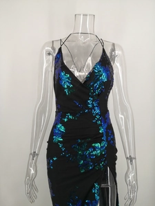 Detail of sequin evening dress with V-neck, floral embroidery, and high side slit