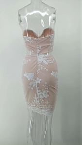 Detail of pink sequin lace mini dress with back cutout and 3D floral embroidery