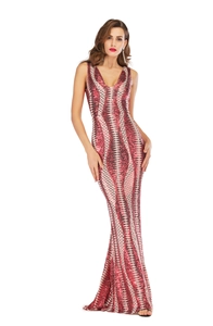 Detailed view of backless sequined evening gown with geometric diamond and wave patterns