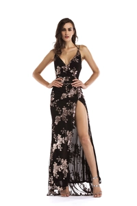 Close-up of rose gold sequin floral patterns on a sexy black slit evening gown
