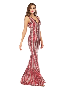 Close-up of sequin evening dress with red and silver geometric diamond pattern and V-neck