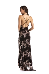 Detail of cross straps on backless black dress with rose gold sequin floral patterns