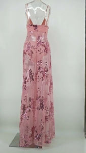 Detailed view of pink sequin floral pattern on translucent evening tulle gown