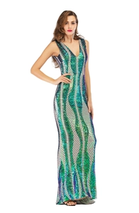 Close-up of emerald green and blue sequins forming a geometric pattern on a deep V-neck gown