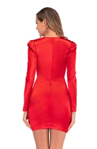 Close-up of the back zipper and elegant puff sleeves on a red satin cocktail dress