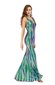 Detail of sequined fishnet fabric on deep V-neck backless mermaid evening gown