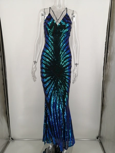 Detailed view of shimmering sequins and V-neckline on this elegant backless maxi evening dress