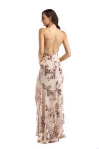 Detail view of cross back straps and shimmering rose gold sequins on backless evening dress