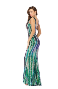 Close-up of sparkling gradient sequins on a backless mermaid evening gown