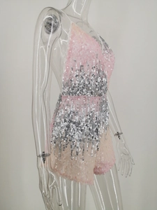 Detail of pink and silver sequin gradient jumpsuit with open back and sexy V-neck