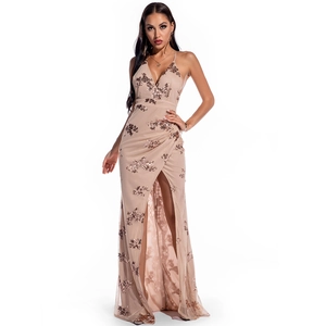 Detailed embroidery of sequins on a champagne backless V-neck slit evening gown