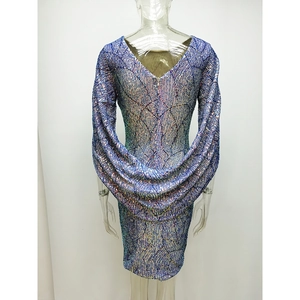 Deep blue sequin cocktail dress featuring a backless V-neck and draped sleeves