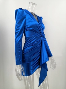 Detail of royal blue satin mini dress with bubble sleeves and draped waist pleats