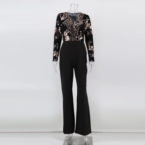 Detail view of the deep V-neckline with rose gold sequin embroidery on black jumpsuit