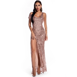Detail view of rose gold sequin evening gown with high slit and asymmetric neckline design
