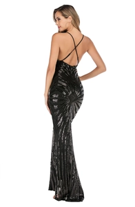 Detail of cross-back straps and sequins on a sexy V-neck black evening gown