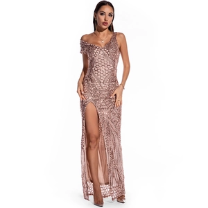 Detail of rose gold sequin dress with geometric patterns and a high side slit