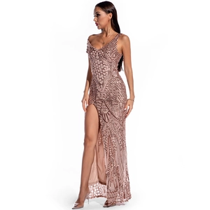 Close-up of geometric sequin patterns and high slit detail on rose gold evening gown