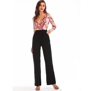 Close-up of sequin embroidery and V-neck mesh detail on this long sleeve jumpsuit