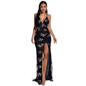 Detail of rose gold sequin embroidery on a black V-neck slit dress with mesh texture