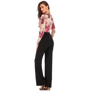 Detail of floral sequin patterns on long sleeve bodice and high waist trousers