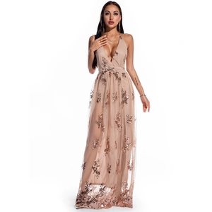 Detail of rose gold sequins on champagne halter deep V-neck long party gown