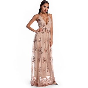 Close-up of champagne sequins and floral embroidery on a deep V-neck maxi dress mesh