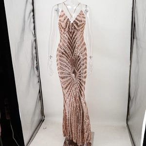 Detail of rose gold sequin evening gown with geometric stripes and crisscross straps