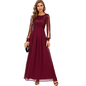 Detail of burgundy sequin bodice and fringed slit sleeves on a long chiffon maxi dress