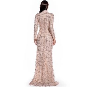 Champagne fishtail evening dress with gold sequins and sheer mesh back detail