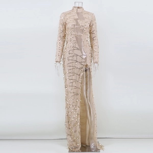 Detail of champagne sequin gown featuring geometric cutout design and high slit