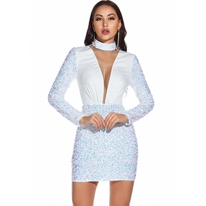 Close-up of white sequin bodycon dress with deep V-neck and matching choker detail