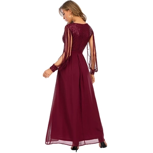 Elegant burgundy sequin maxi dress with flowing tassel sleeves and chiffon skirt back view