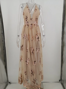 Detail of rose gold sequin floral embroidery on champagne tulle evening dress