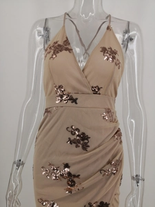 Detail of V-neck sequined champagne dress with rose gold floral embroidery and ruching