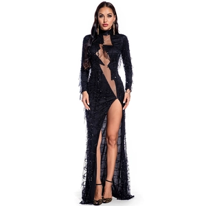 Detail of black sequined gown featuring asymmetric cut-out mesh and high slit design