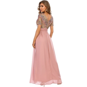 Elegant V-neck evening maxi dress with sequin bodice and pink flowing chiffon skirt